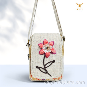 Bolso bandolera hecho a mano de algodón y poliéster con flores de seis pétalos